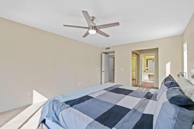 bedroom with ceiling fan and carpet