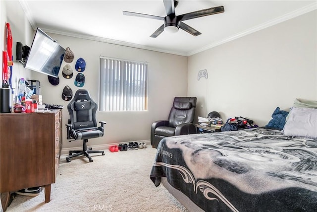 bedroom featuring ceiling fan, carpet, and crown molding