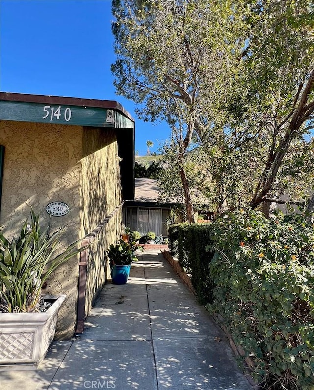 view of home's exterior featuring a patio