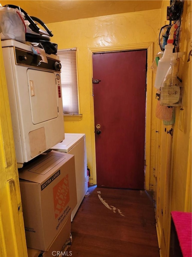 laundry area with dark hardwood / wood-style flooring