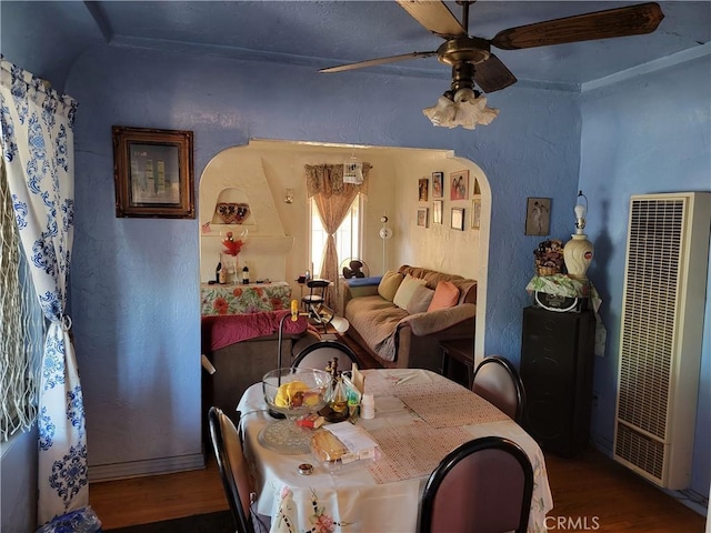 dining area featuring hardwood / wood-style flooring and ceiling fan