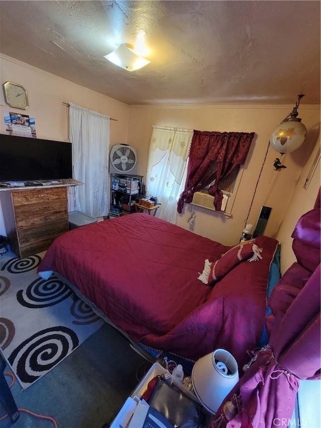 bedroom featuring a textured ceiling