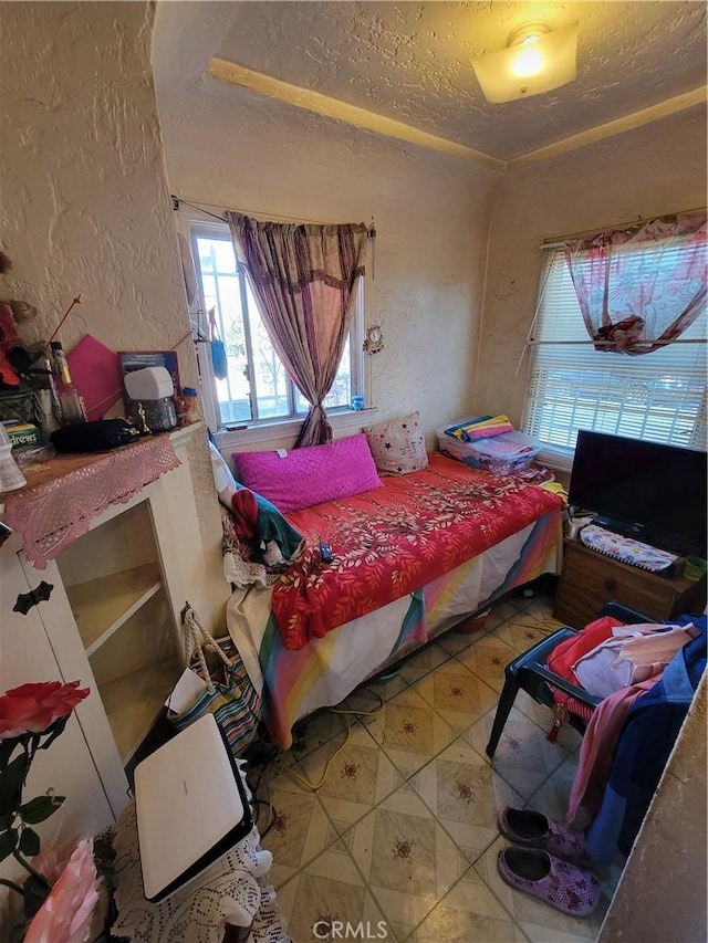 bedroom with a textured ceiling