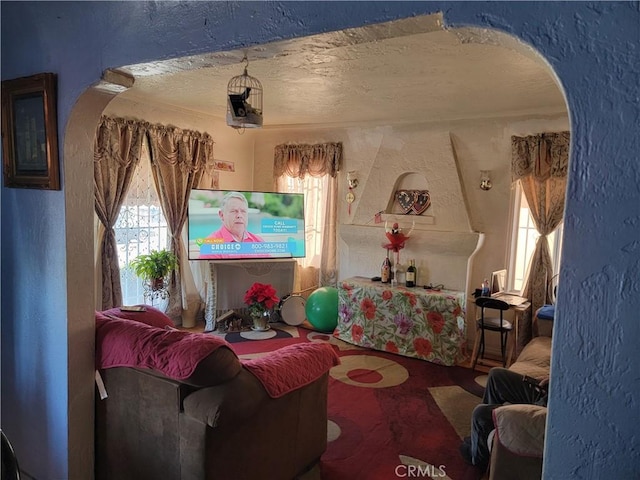 sitting room featuring a textured ceiling