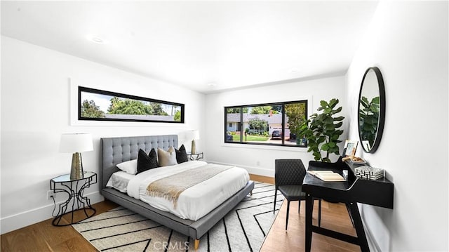 bedroom featuring wood-type flooring