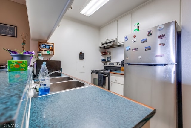 kitchen featuring white cabinets, appliances with stainless steel finishes, and sink