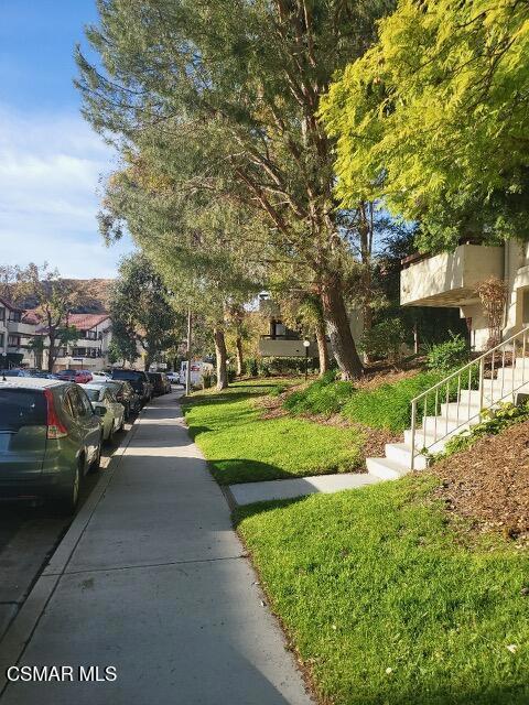 exterior space featuring a lawn