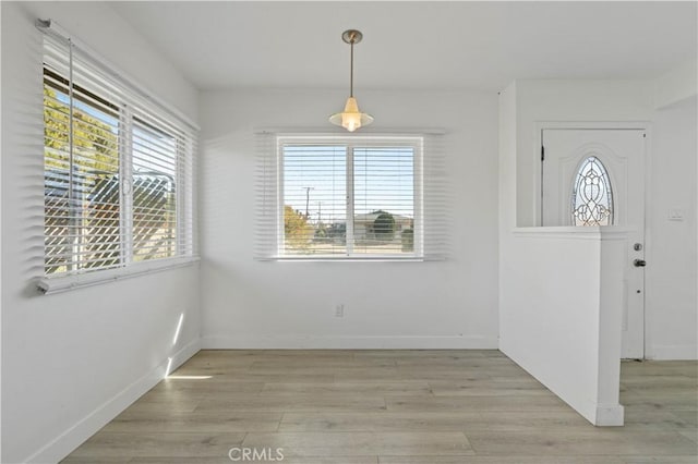 entrance foyer featuring light hardwood / wood-style floors