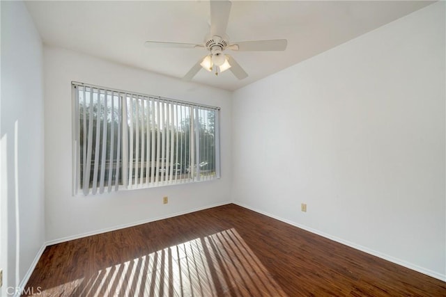 empty room with ceiling fan and hardwood / wood-style floors