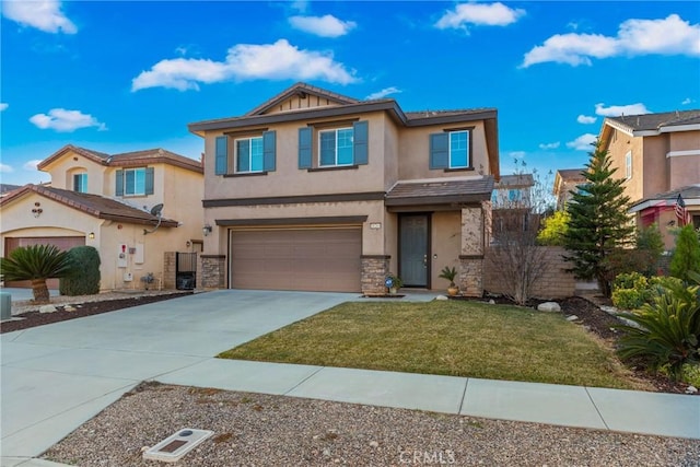 view of front facade featuring a front yard and a garage