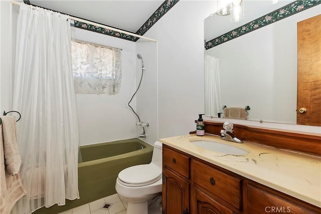 full bathroom featuring toilet, tile patterned floors, vanity, and shower / bath combo with shower curtain