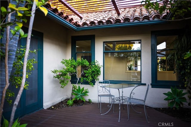 wooden deck with a pergola