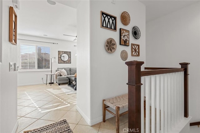 hallway with light tile patterned flooring