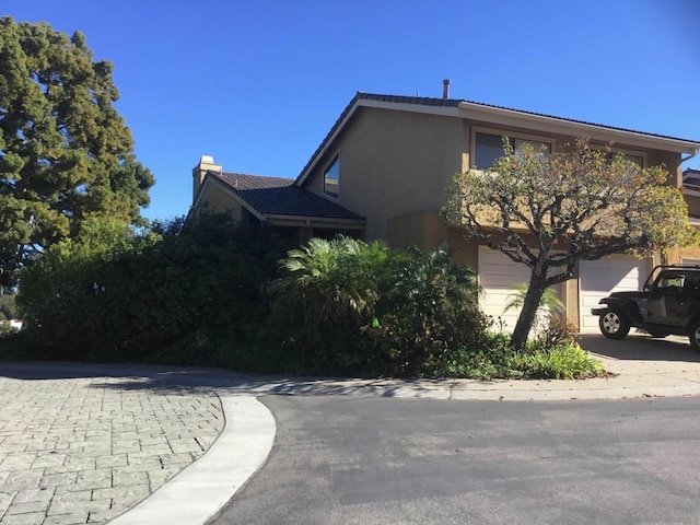 view of home's exterior featuring a garage