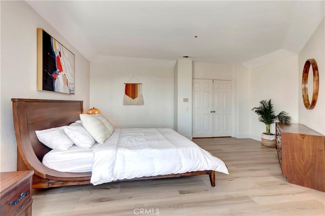 bedroom with light hardwood / wood-style floors