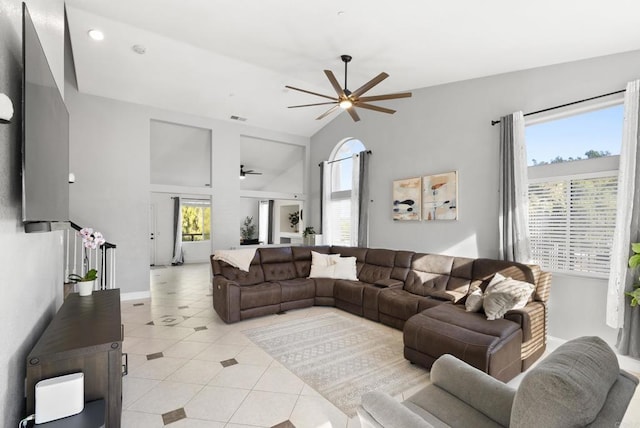 tiled living room featuring lofted ceiling