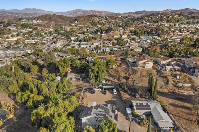 drone / aerial view featuring a mountain view