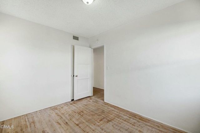 empty room featuring light hardwood / wood-style flooring