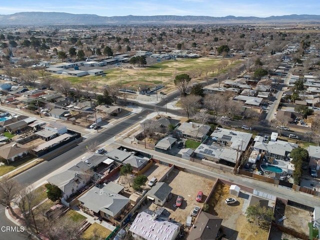 drone / aerial view featuring a mountain view