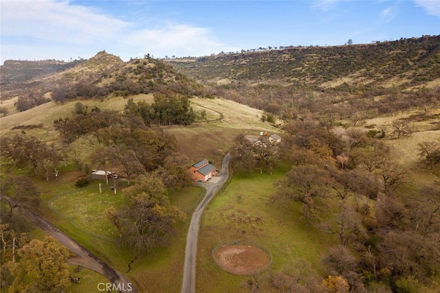 aerial view featuring a rural view and a mountain view