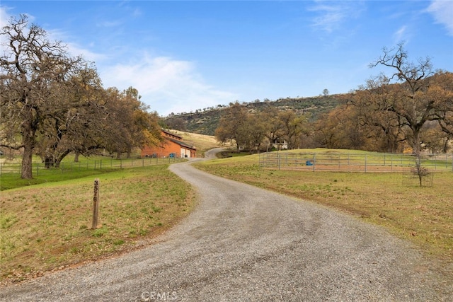 view of road featuring a rural view