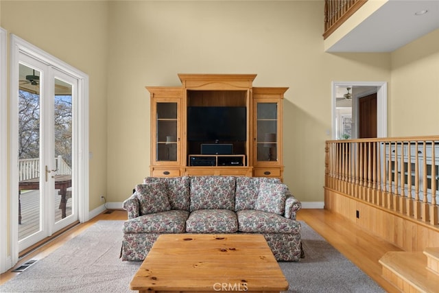 living room with light hardwood / wood-style flooring