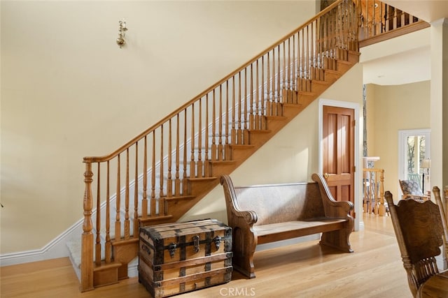 staircase featuring hardwood / wood-style floors