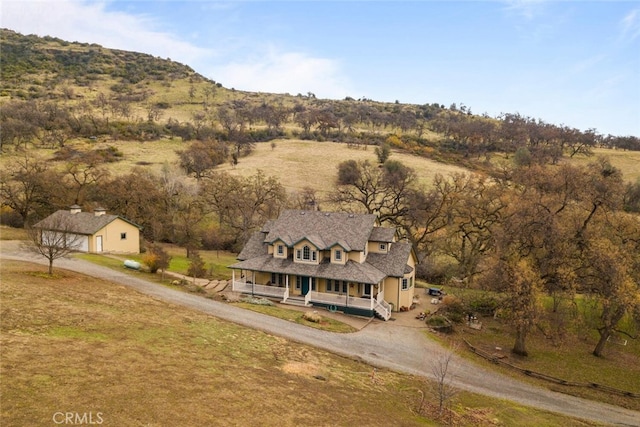 drone / aerial view with a mountain view