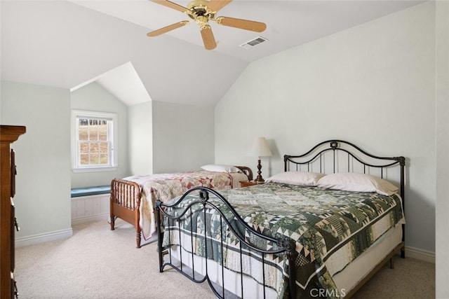 bedroom featuring light carpet, ceiling fan, and vaulted ceiling