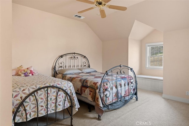 carpeted bedroom featuring ceiling fan and lofted ceiling