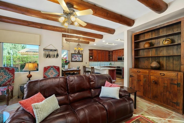 living room with ceiling fan with notable chandelier, light tile patterned floors, and beam ceiling