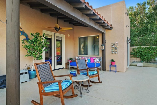 view of patio / terrace featuring ceiling fan