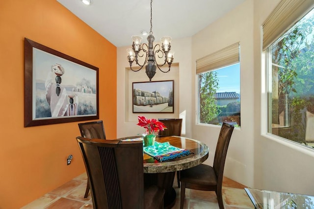 dining room featuring a notable chandelier