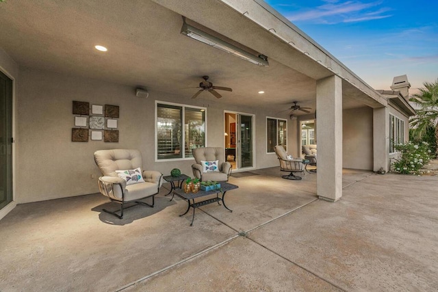 patio terrace at dusk with ceiling fan