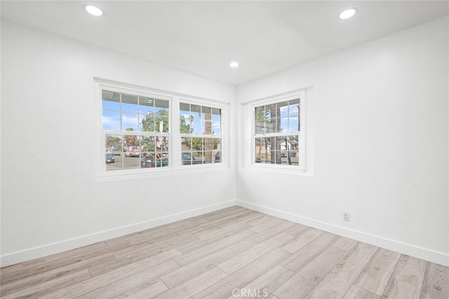 empty room featuring light hardwood / wood-style floors