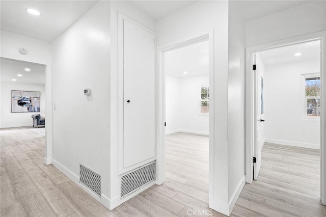 hallway featuring light wood-type flooring