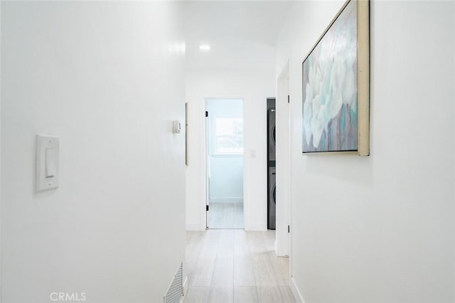 corridor featuring light hardwood / wood-style flooring