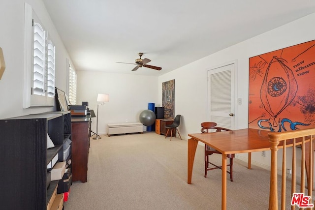 office with ceiling fan and carpet flooring