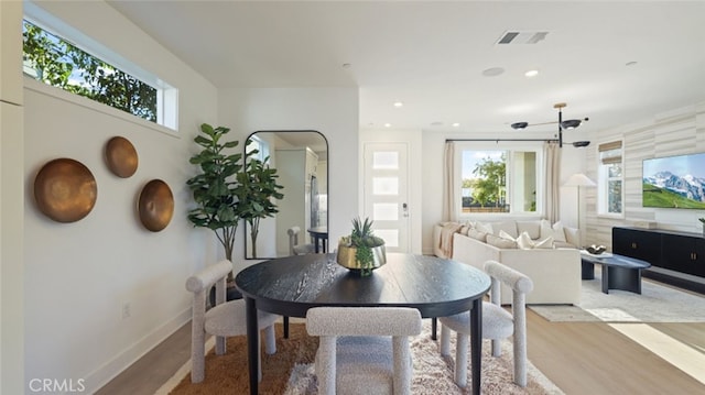 dining space featuring light hardwood / wood-style floors