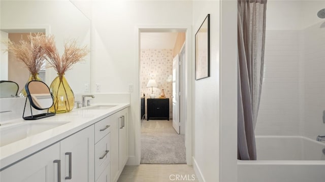 bathroom with vanity and shower / bath combo