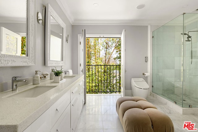 bathroom with vanity, toilet, crown molding, and an enclosed shower