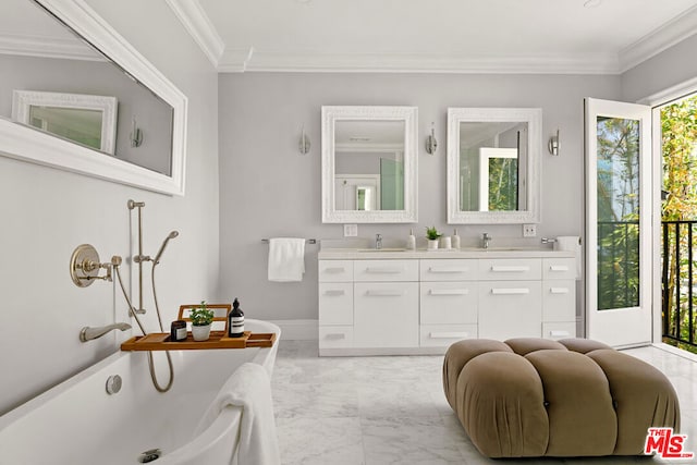 bathroom with a tub to relax in, vanity, and ornamental molding