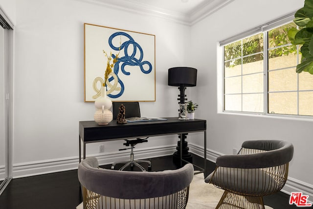 home office with crown molding and hardwood / wood-style flooring