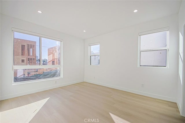 empty room featuring light hardwood / wood-style floors