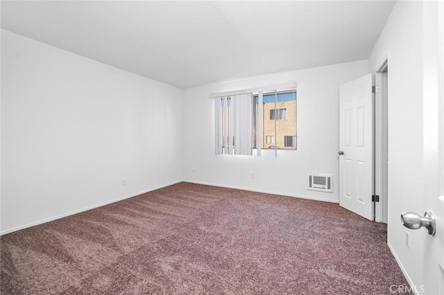 unfurnished room featuring carpet