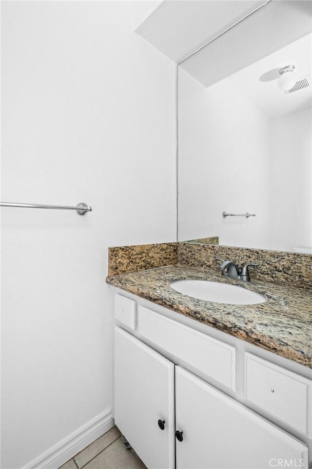 bathroom featuring vanity and tile patterned flooring