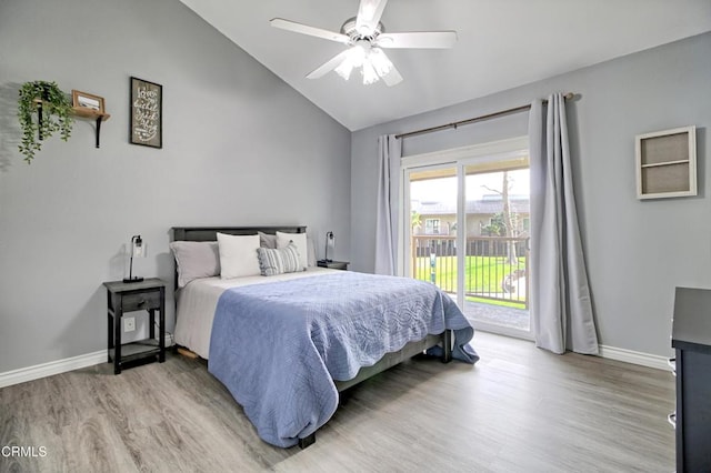 bedroom featuring ceiling fan, lofted ceiling, light hardwood / wood-style flooring, and access to outside