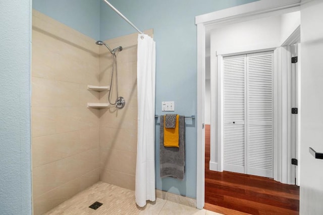 bathroom with a shower with curtain