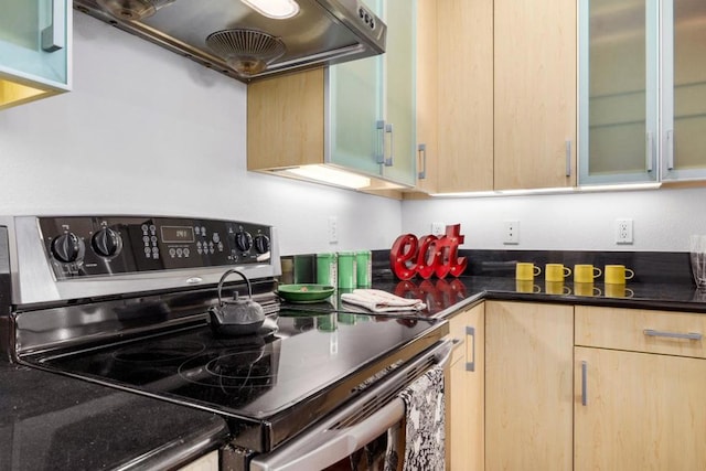 kitchen with stainless steel range with electric stovetop, ventilation hood, and light brown cabinets