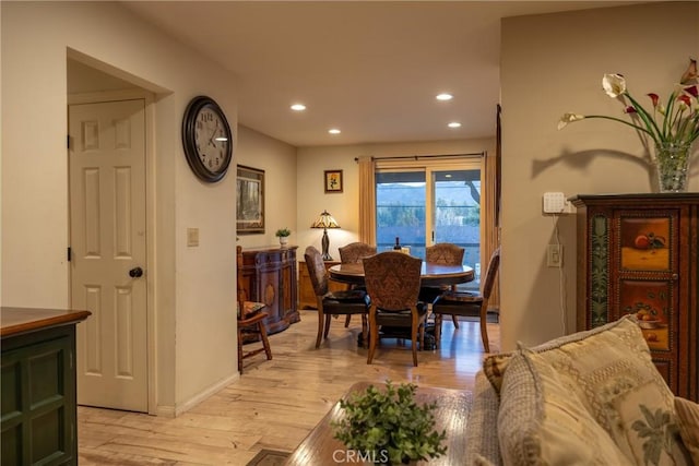 dining space featuring light hardwood / wood-style floors